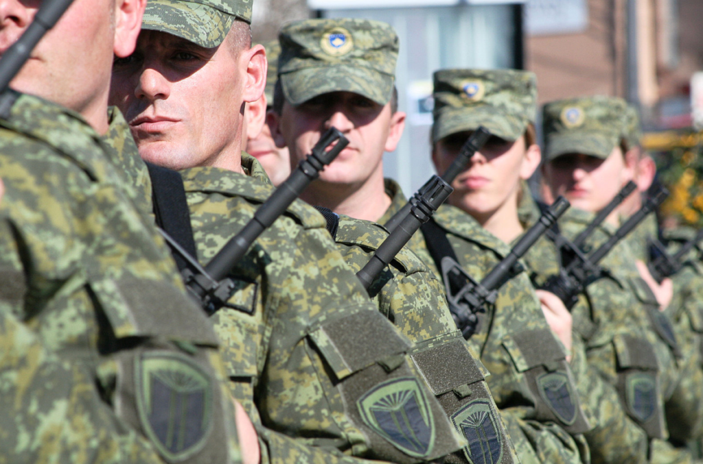 Une image contenant uniforme militaire, habits, Militaire, arméeDescription générée automatiquement