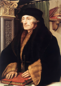 A person in a black hat and fur coatDescription automatically generated