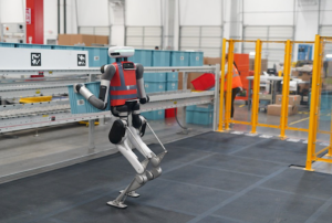 A robot in a warehouseDescription automatically generated