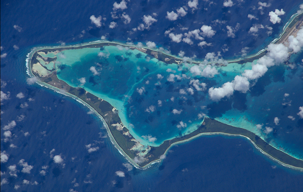 An aerial view of a small islandDescription automatically generated