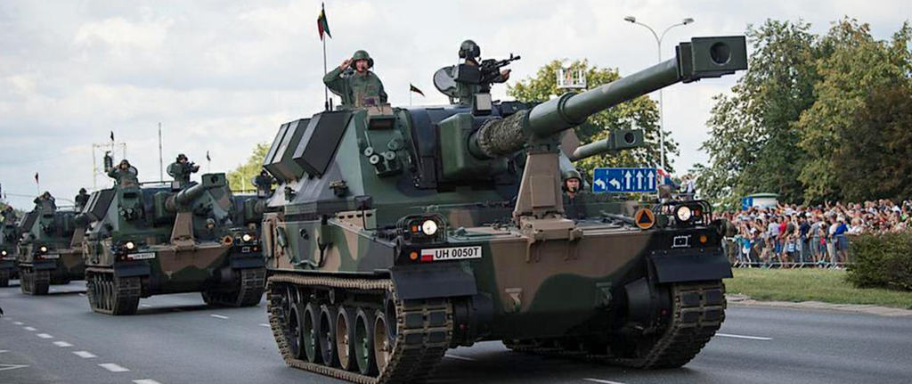 A military tank on a streetDescription automatically generated