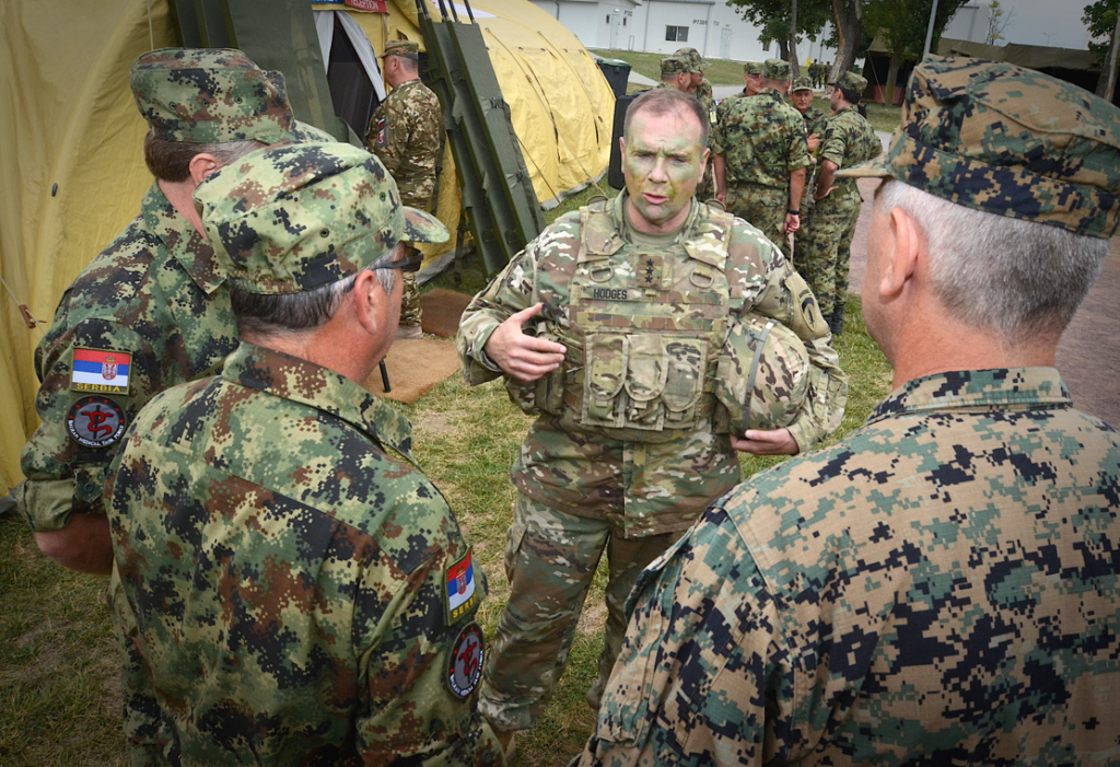 A group of men in military uniformsDescription automatically generated
