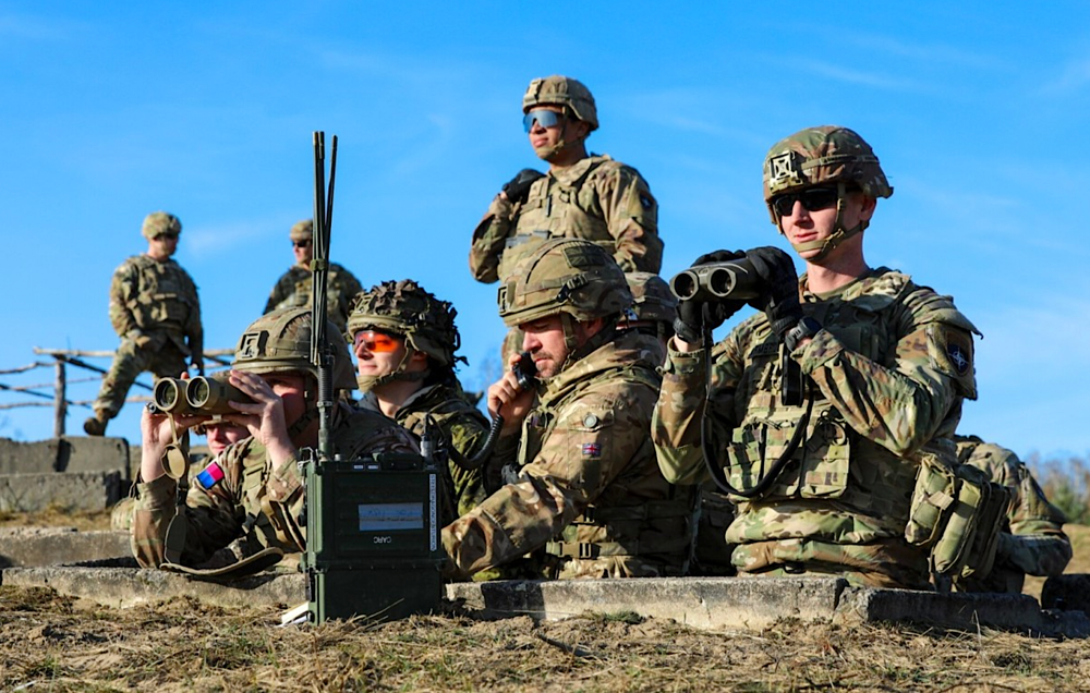 A group of soldiers in uniformDescription automatically generated