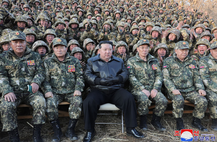 A group of men in military uniformsDescription automatically generated