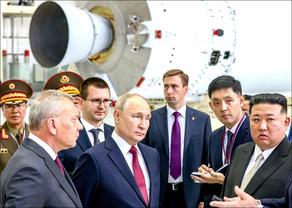 A group of men in suitsDescription automatically generated