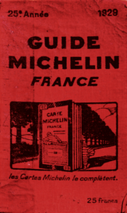 A red sign with black text Description automatically generated